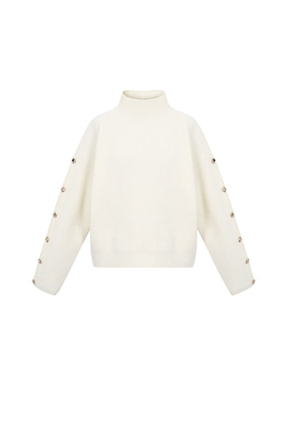 Trui met knopen op de mouwen