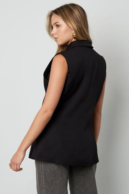 De mouwloze blazer